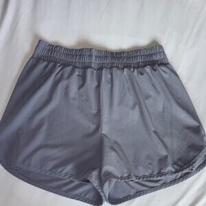 Beyond yoga in stride running shorts lined size small